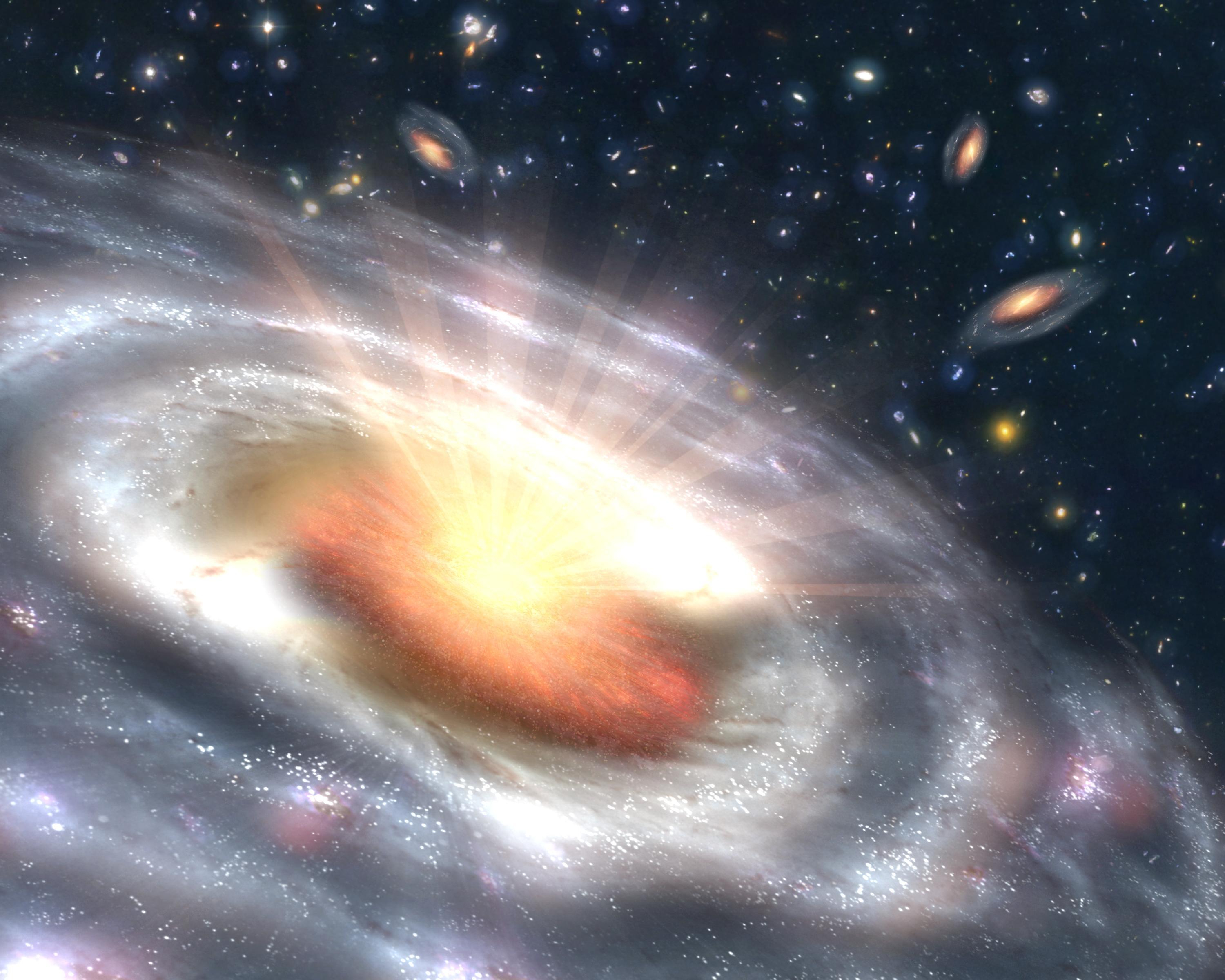 یک کهکشان در حال چرخش پرتوهای زرد را به فضای سیاه پر از کهکشان های کوچکتر دیگر می تاباند.