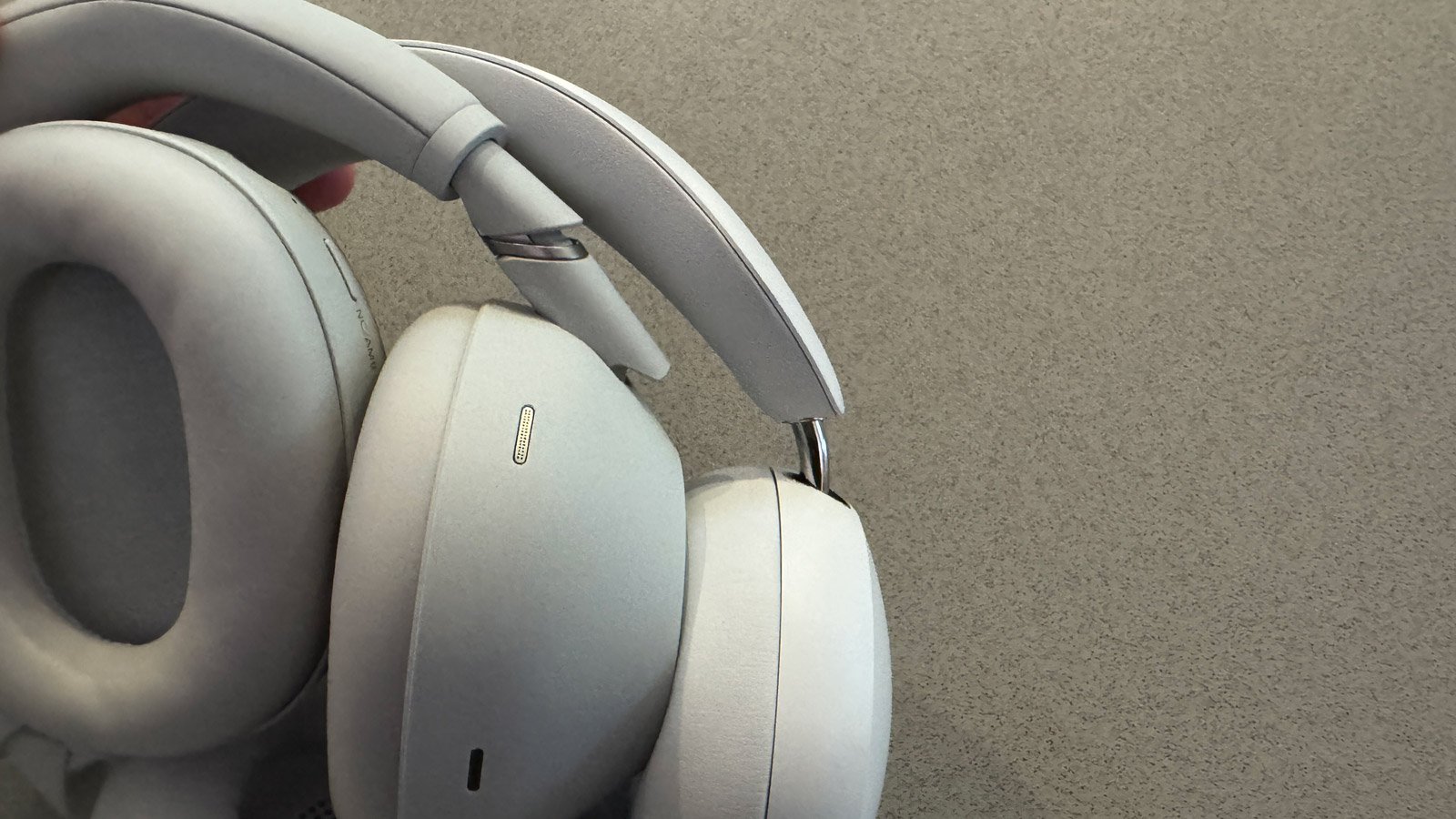 Side view of hinges of the Sony WH-1000XM6 and Sonos Ace headphones