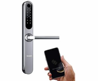 A silver door handle with keycode