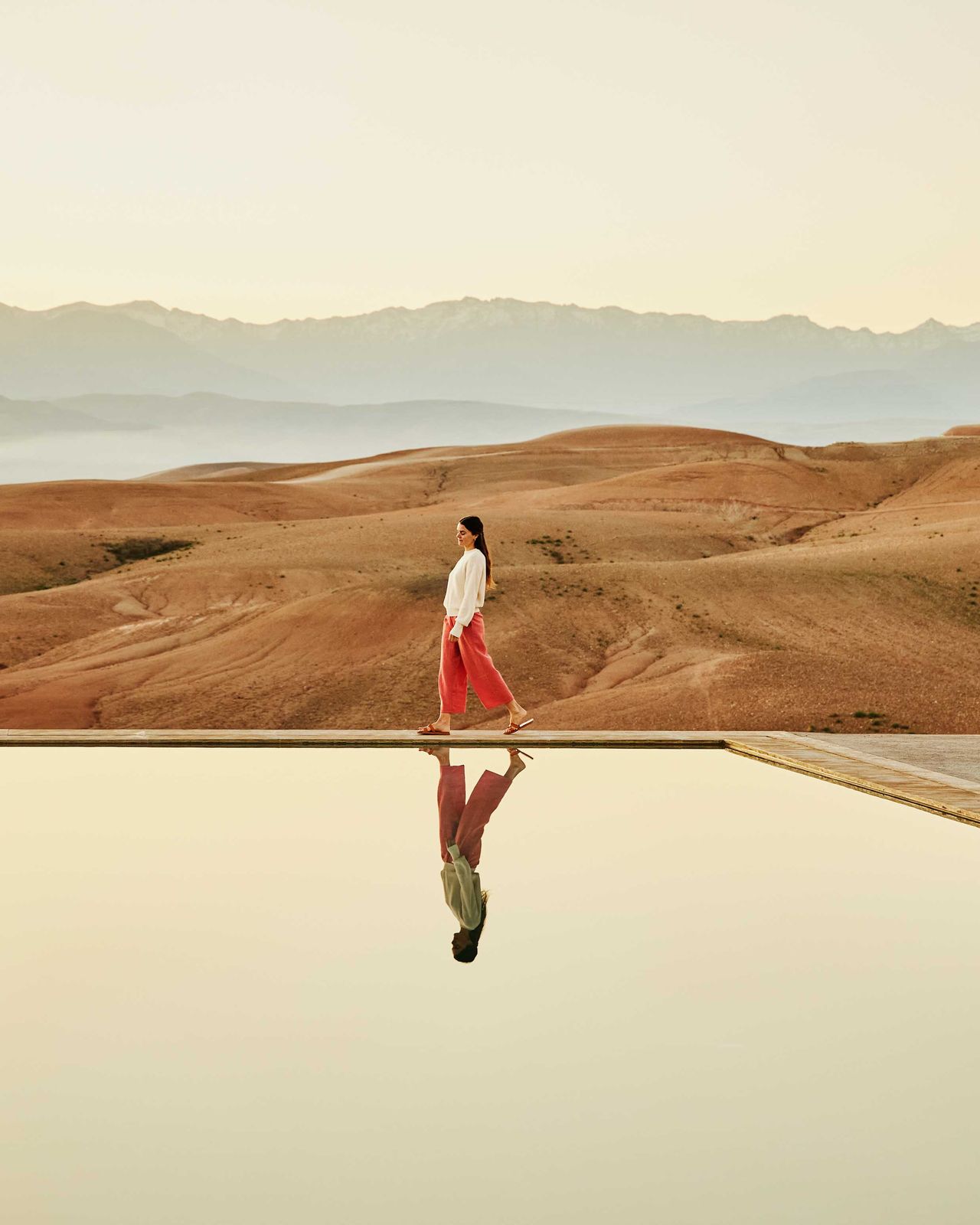 woman in desert by pool