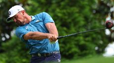Bryson DeChambeau hits a drive