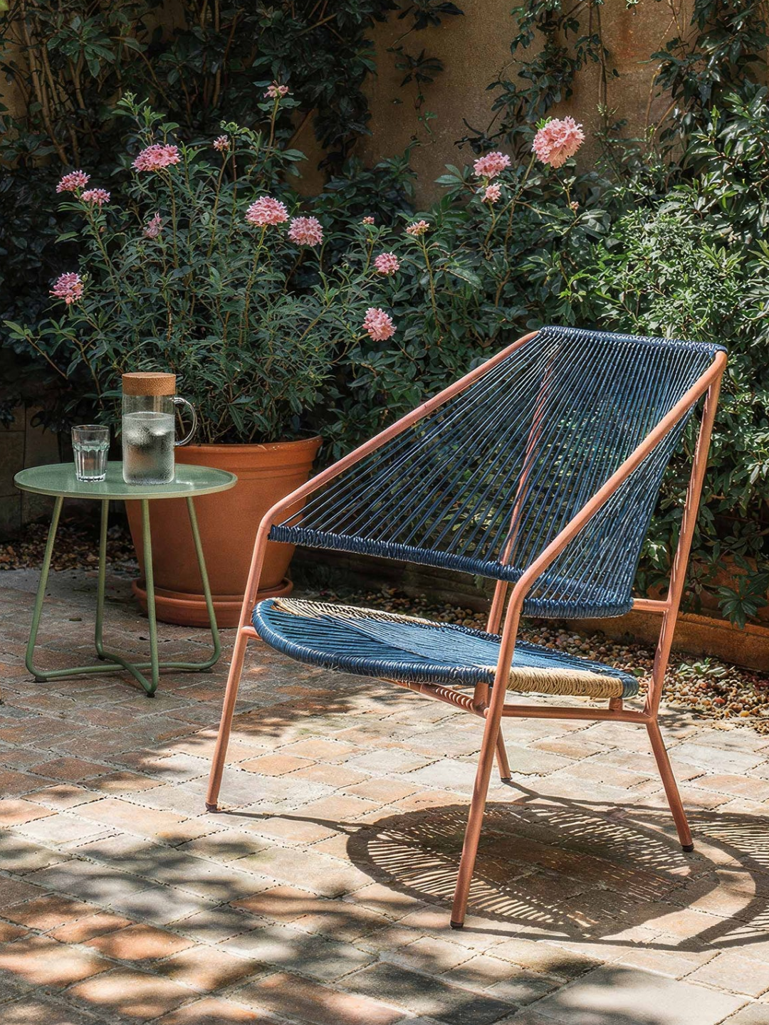 A blue and orange garden lounge chair from Westwing