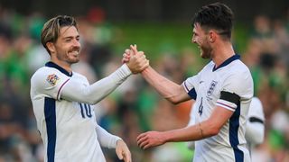 Jack Grealish (L) and Declan Rice celebrate their goals in the 2024 Nations League ahead of the England vs Finland live stream.