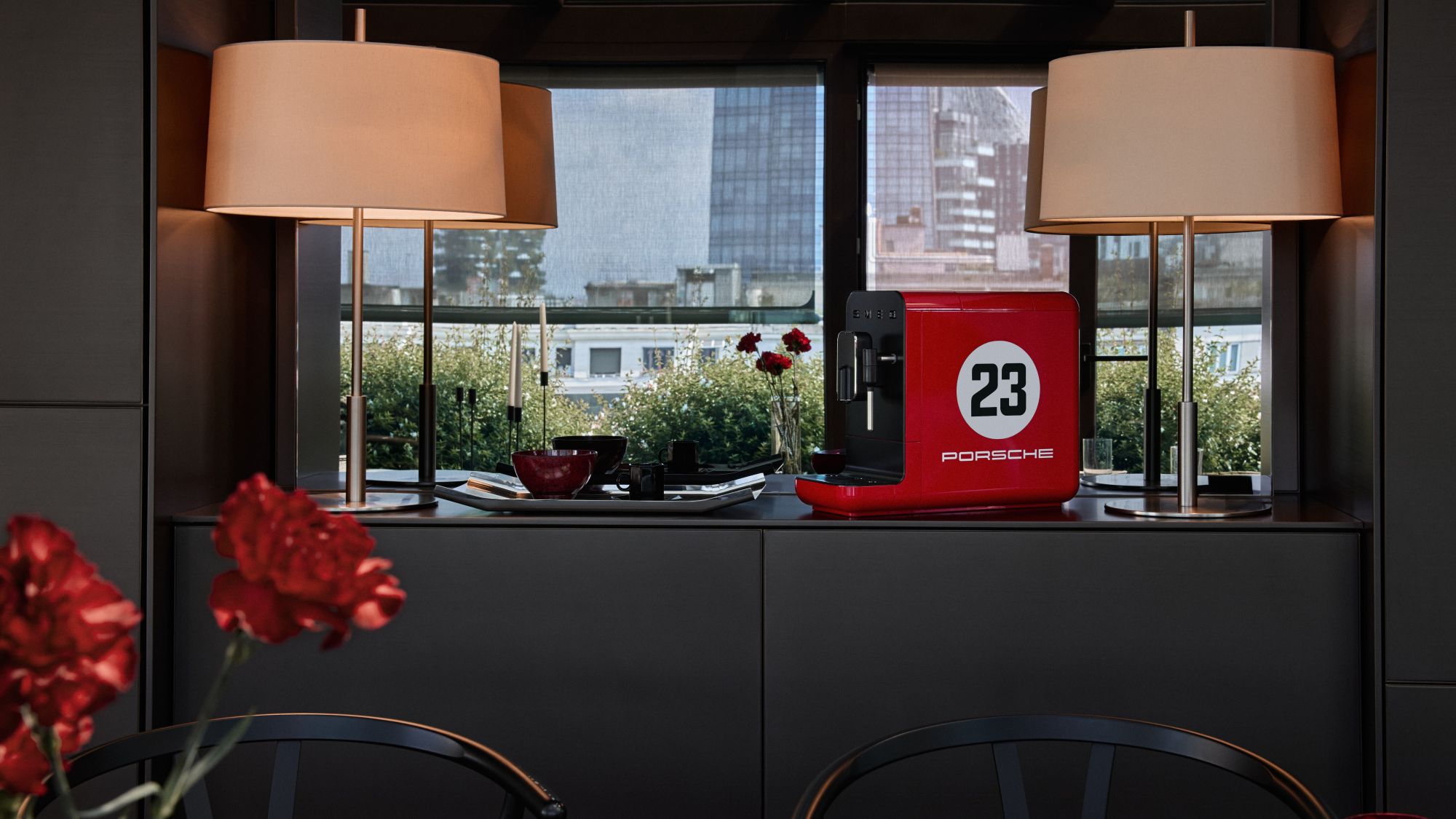 Porsche + Smeg collaboration fridge and coffee machine in kitchen