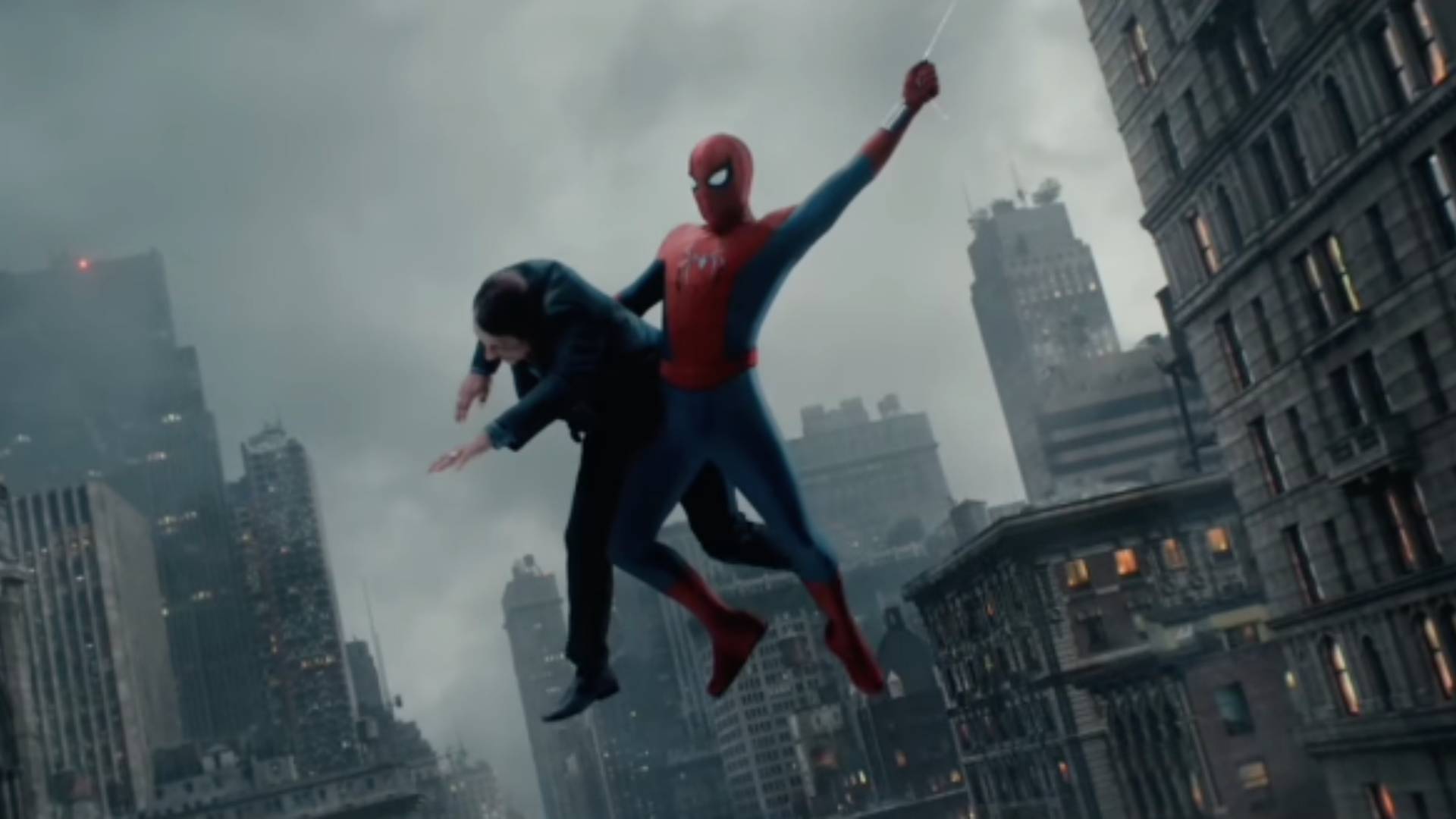 A screenshot from a Spider-Man: Brand New Day trailer clip featuring Spider-Man web-swinging while holding a man