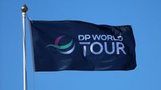 A DP World Tour flag blows in the wind