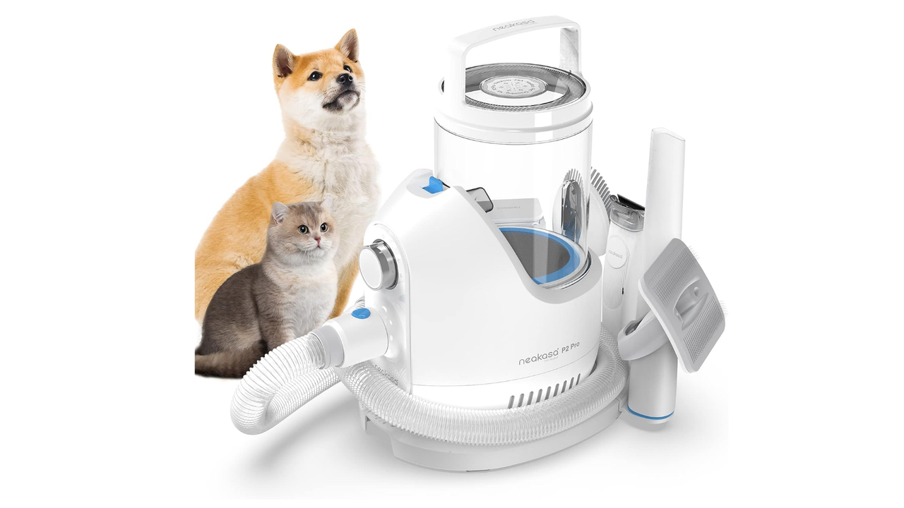 Neakasa P2 Pro Grooming Kit next to a cat and a dog