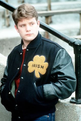 sean astin wears a notre dame fighting irish jacket in rudy