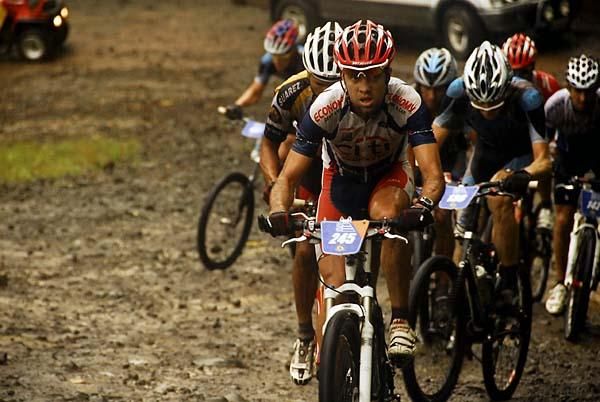Deiber Esquivel followed by Manny Prado as they reach the top of the mountain.