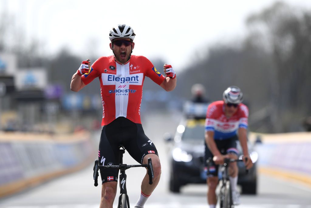OUDENAARDE BELGIUM APRIL 04 Arrival Kasper Asgreen of Denmark and Team Deceuninck QuickStep Celebration Mathieu Van Der Poel of Netherlands and Team AlpecinFenix during the 105th Ronde van Vlaanderen Tour of Flanders 2021 Mens Elite a 2515km race from Antwerp to Oudenaarde RVV21 rondevanvlaanderen tourofflanders on April 04 2021 in Oudenaarde Belgium Photo by Tim de WaeleGetty Images