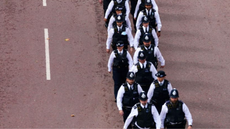A line of police officers walking