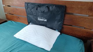 The Dreams Tempur Cloud Air SmartCool Medium Pillow on our tester's bed