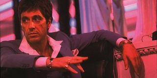 Scarface Al Pacino Tony Montana lounging in the club