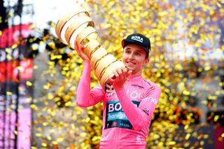 VERONA ITALY MAY 29 Jai Hindley of Australia and Team Bora Hansgrohe Pink Leader Jersey celebrates at podium with the Trofeo Senza Fine as overall race winner during the 105th Giro dItalia 2022 Stage 21 a 174km individual time trial stage from Verona to Verona ITT Giro WorldTour on May 29 2022 in Verona Italy Photo by Michael SteeleGetty Images