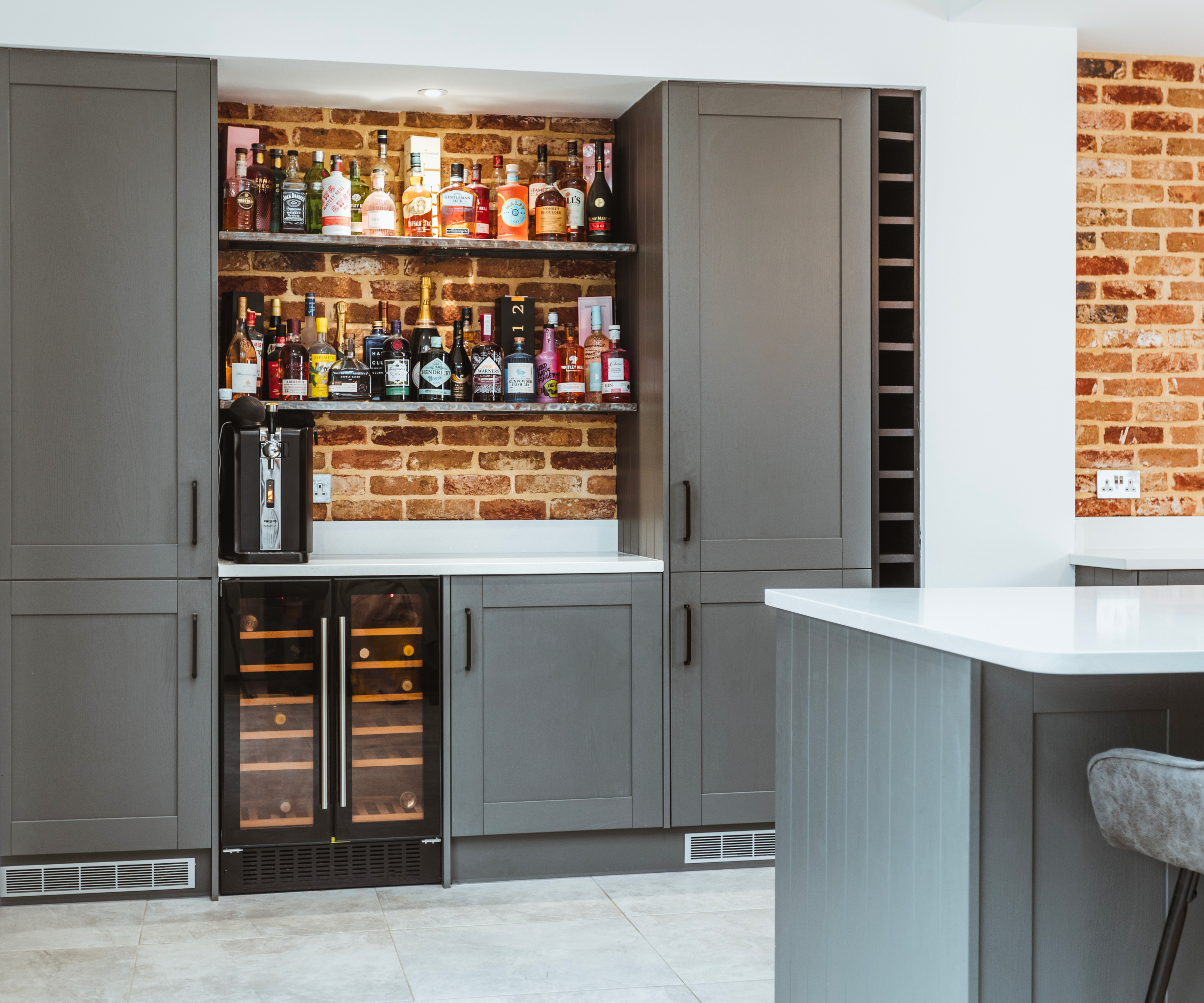 Wren Shaker kitchen in grey with wine fridge and rack