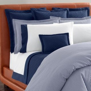 Organic Cotton Shirting Stripe Bedding Collection on a bed.