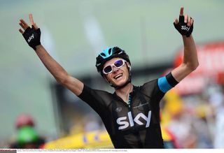 Chris Froome celebrates his win on stage 8