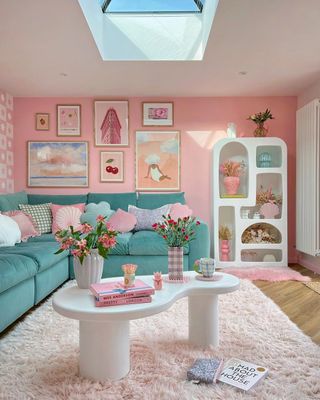 Blue couch in pink room