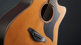 Close up of the body of a Yamaha A5R ARE acoustic guitar