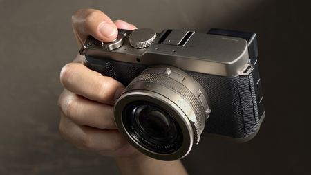 Panasonic Lumix L10 being held by hand