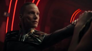 a woman on a spaceship confronts an enemy