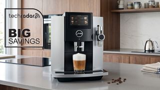 Jura S8 coffee machine on a kitchen counter.