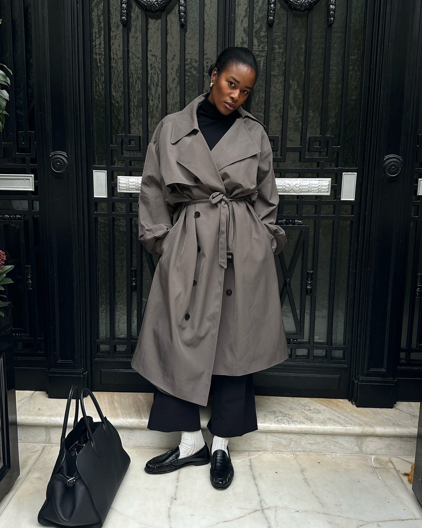 An image of @nlmarilyn wearing one of the most iconic shoes, Saint Laurent loafers.