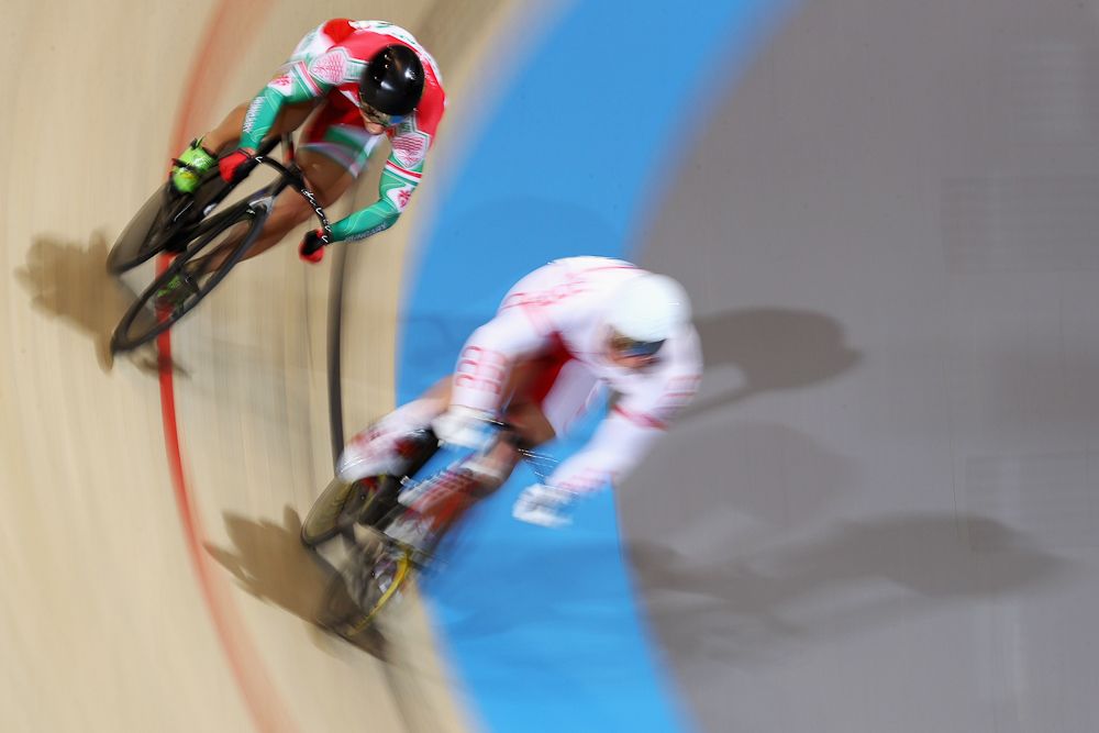 andor Szalontay (L) of Hungary and Kamil Kuczynski of Poland compete in the Men's Sprint 1/8 Finals