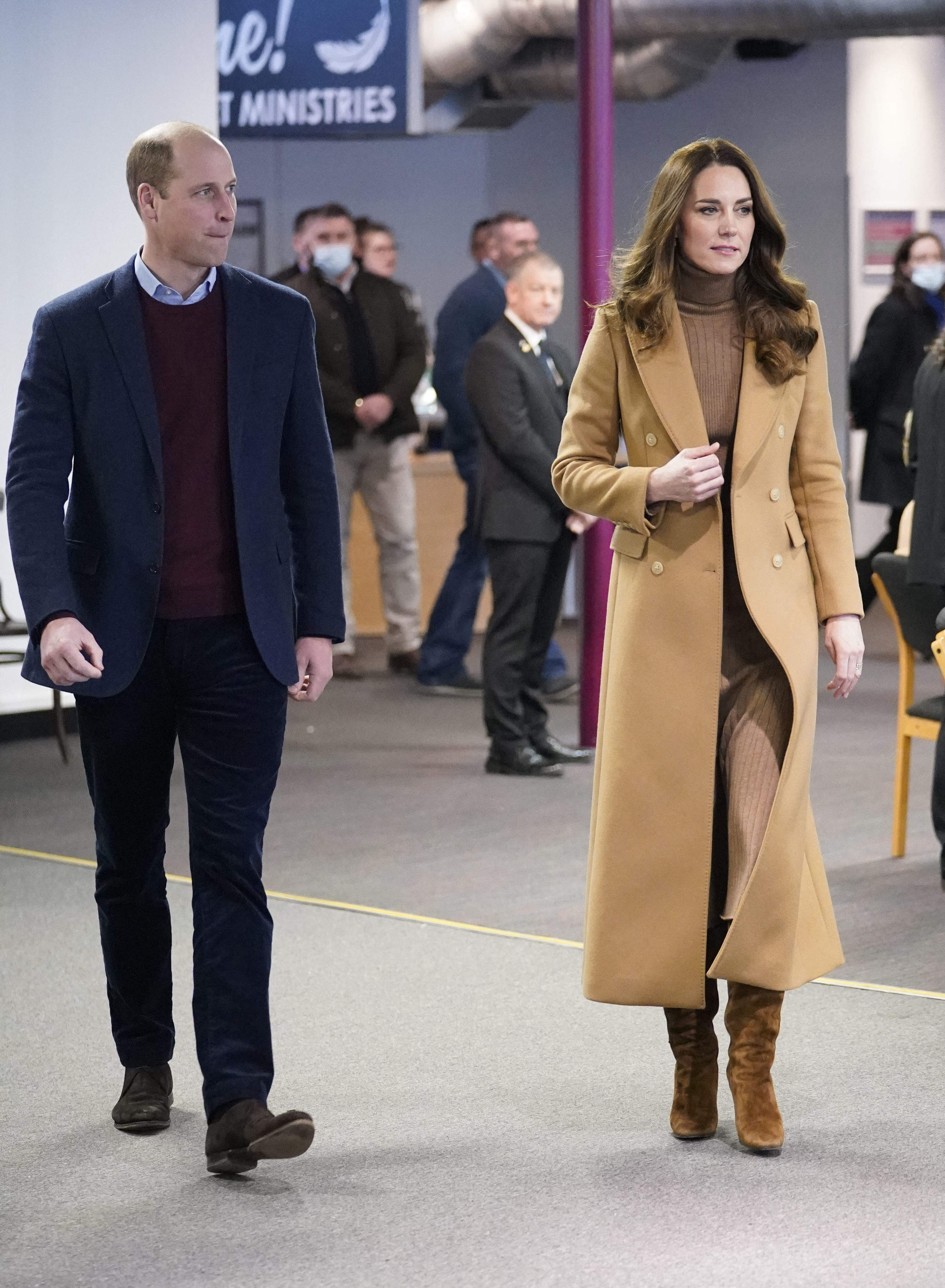 Britain's Prince William, Duke of Cambridge (L) and Britain's Catherine, Duchess of Cambridge, visit Church on the Street in Burnley, northern England on January 20, 2022
