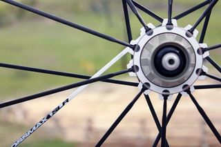 Mavic's 'Isopulse' radial drive-side lacing pattern is said to offer 2mm more width to the hub's flange spacing and better balance spoke tension side to side