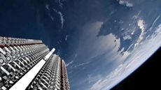 An image from Earth orbit with metal craft stacked on the left.