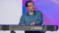 Austin Wintory playing a keyboard