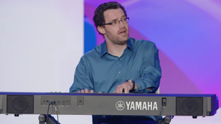 Austin Wintory playing a keyboard