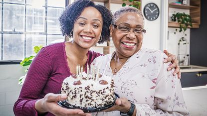 Old lady with a birthday cake