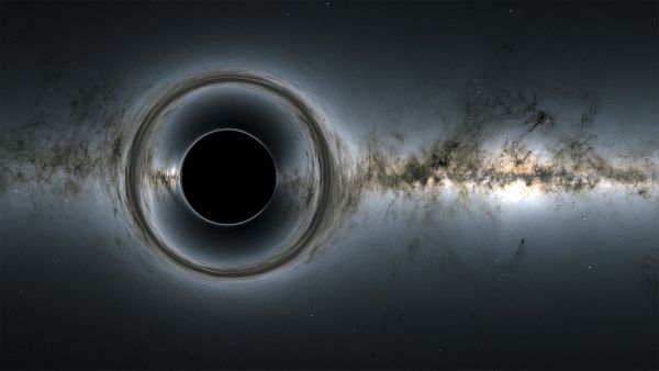 This NASA illustration depicts a solitary black hole in space, with its gravity warping the view of stars and galaxies in the background.