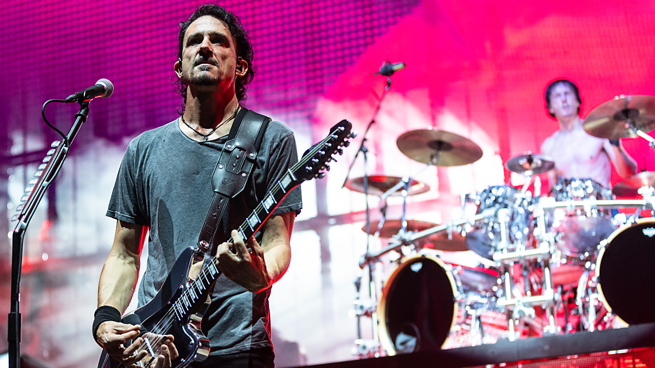 Joe Duplantier and Mario Duplantier of Gojira performing onstage in 2024