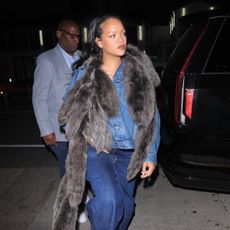 Rihanna is chic in a denim ensemble paired with fur shaw and new Dior bag as she enjoys a late night dinner at Giorgio Baldi in Santa Monica