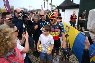 PORTIMAO PORTUGAL FEBRUARY 14 Remco Evenepoel of Belgium and Team Soudal Quick Step meets the fans at start prior to the 50th Volta ao Algarve em Bicicleta 2024 Stage 1 a 2008km stage from Portimao to Lagos on February 14 2024 in Portimao Portugal Photo by Dario BelingheriGetty Images