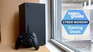 Xbox Series X console by a window with a Tom's Guide Cyber Monday deals badge