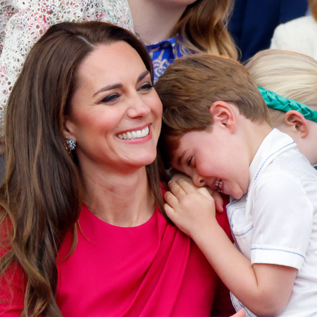 Catherine, Duchess of Cambridge and Prince Louis of Cambridge attend the Platinum Pageant on The Mall on June 5, 2022 in London, England. The Platinum Jubilee of Elizabeth II