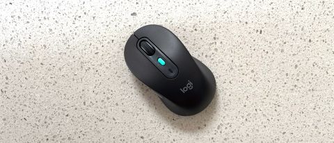 The Logitech Signature AI Edition M750 mouse on a worktop.