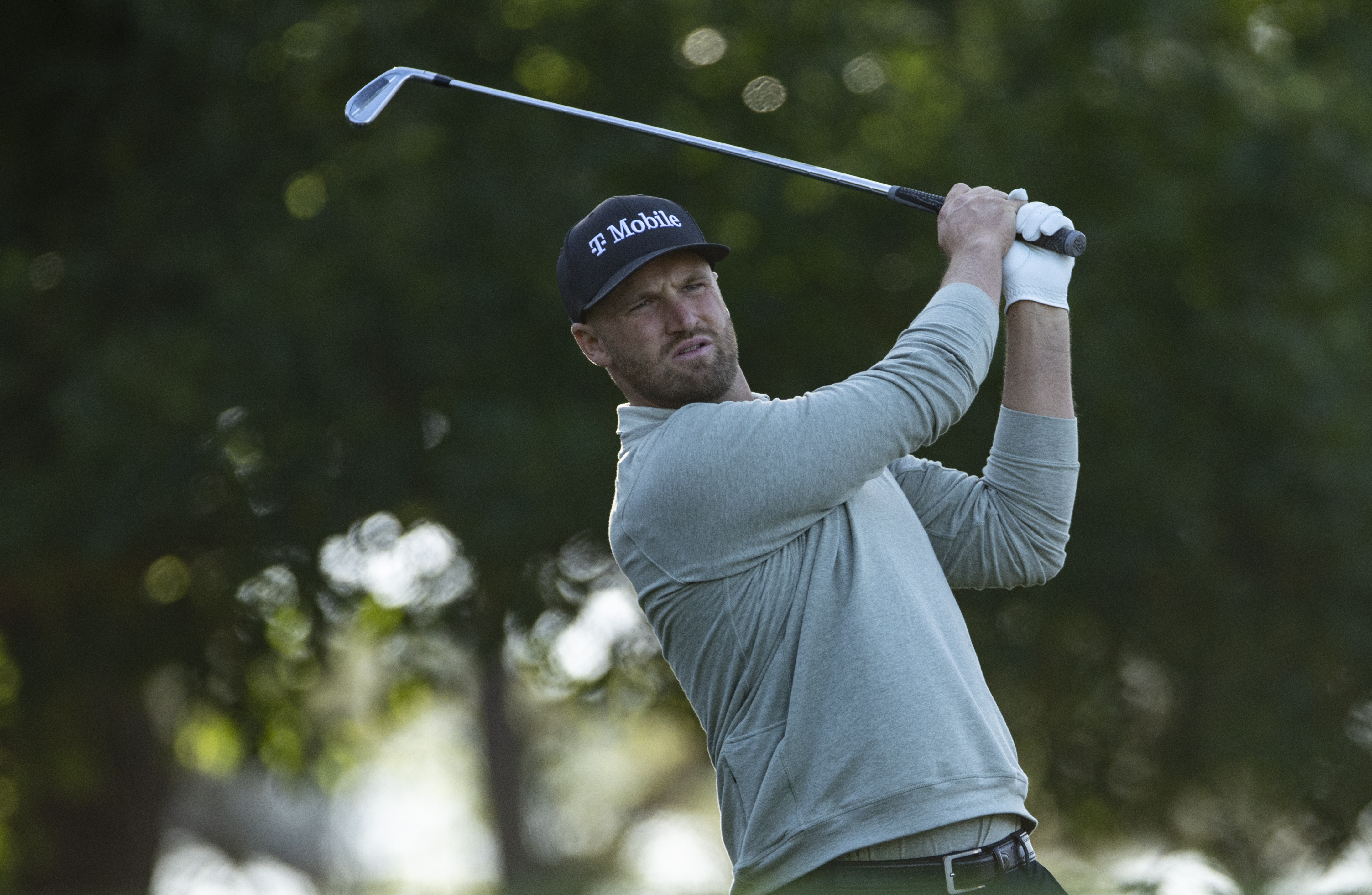 Wyndham Clark plays a stroke from the No. 4 tee during the second round of the Masters at Augusta National Golf Club