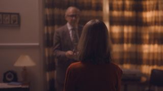The Enfield Poltergeist: a man wearing glasses stands in front of a woman
