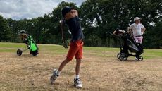 junior golfers on the course