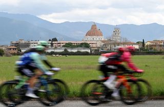 The Tirreno-Adriatico 2025 peloton rides passed the city of Pisa