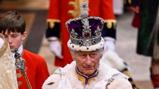 King Charles III departs the Coronation service at Westminster Abbey