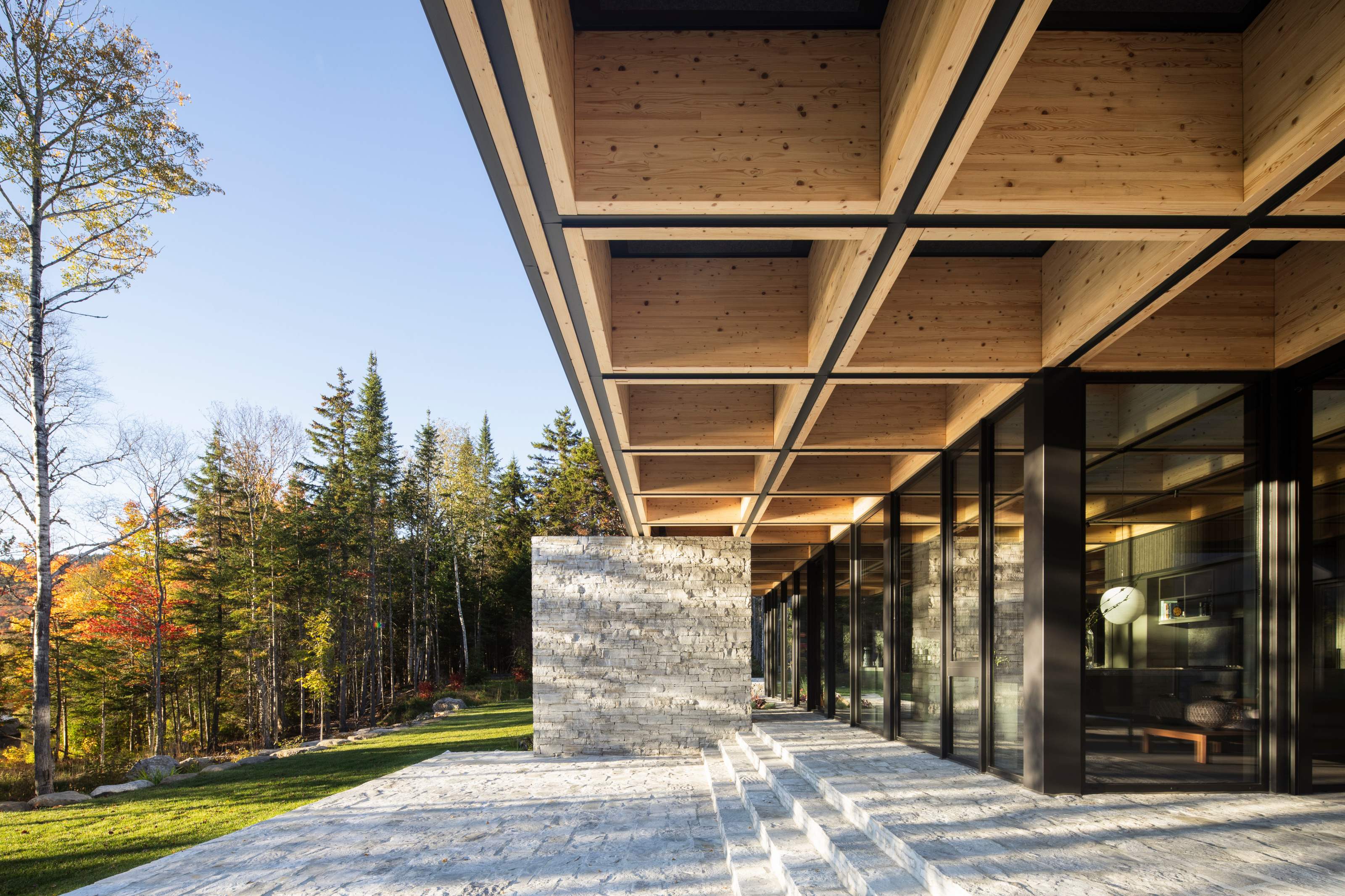 The cantilevered roof structure provides shelter on the west-facing main terrace