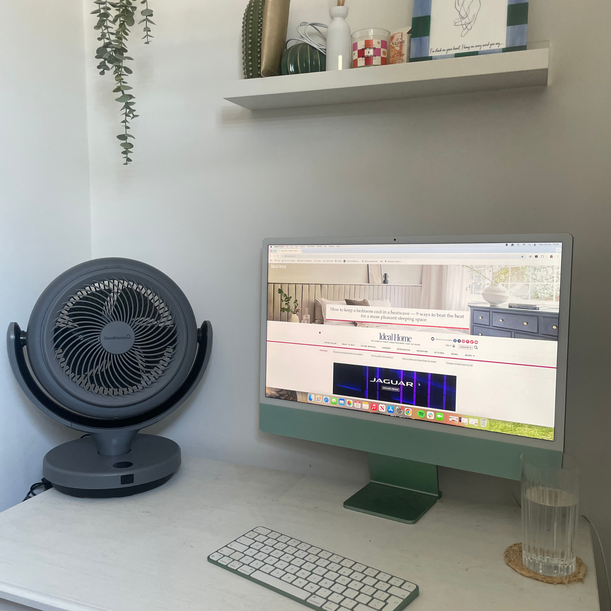 GoodHome 8 24W Remote Controlled Table Fan sitting on a white desk next to a green computer