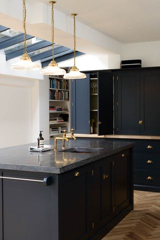 Black painted kitchen with white walls