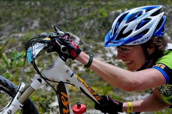 Colorado rider Jenny Smith dismounts her bike on one of the tougher sections.